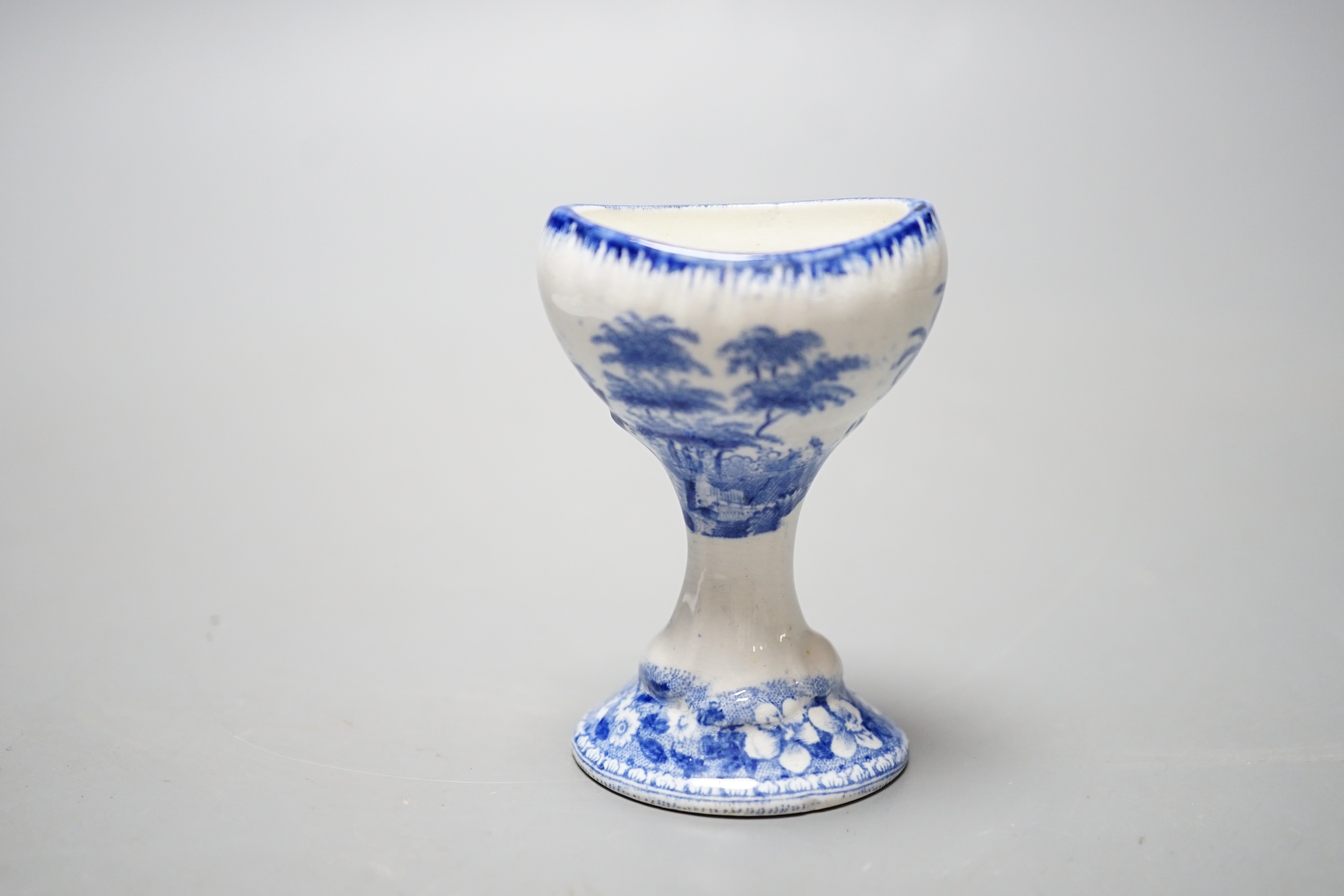 A Spode blue and white transfer printed pottery eye bath, early 19th century 6.9cm high